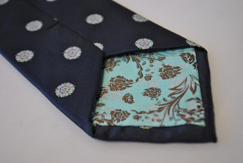 navy tie with white rose flower of yorkshire design