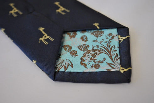 navy tie with giraffe design