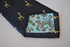 navy tie with giraffe design