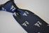 navy tie with dairy cow design
