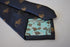 navy tie with brown monkey design