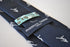navy tie with rugby player silhouette design