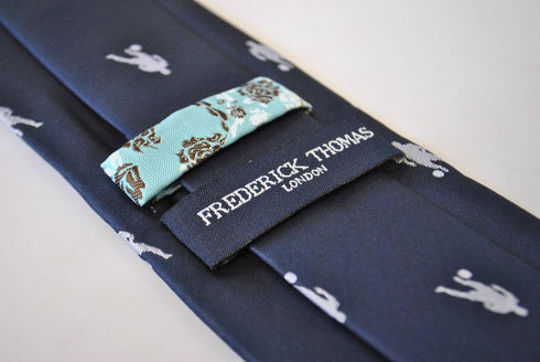 navy tie with football silhouette design