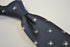 navy tie with white spider silhouette design