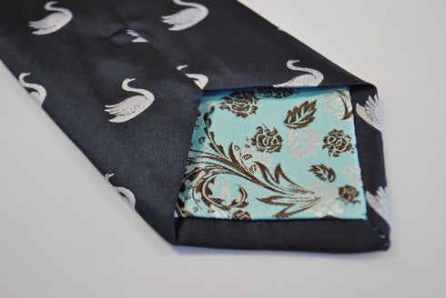 navy blue tie with swan pattern