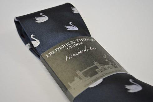 navy blue tie with swan pattern
