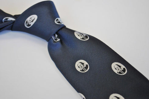 navy blue tie with William Shakespeare pattern