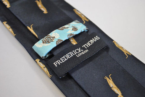 navy tie with meerkat design