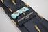 navy tie with meerkat design