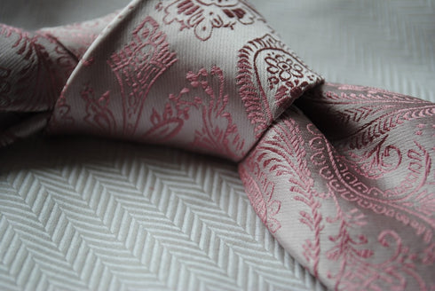 pink tie with paisley design