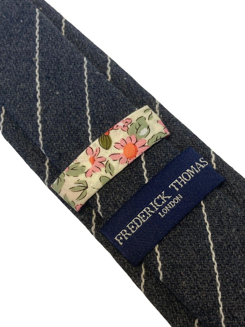 grey and white striped tie