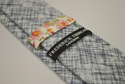 grey blue and white scratched design tie