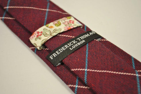 burgundy red tie with blue and cream check design
