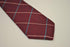burgundy red tie with blue and cream check design