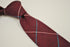 burgundy red tie with blue and cream check design