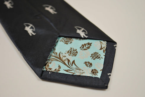 navy blue tie with archer silhouette design