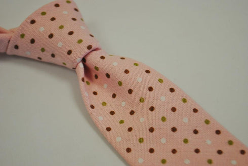 pink tie with red, green and white polka dots