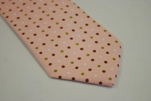 pink tie with red, green and white polka dots