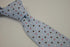 baby blue tie with brown, pink and white polka dots