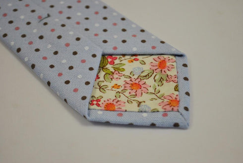 baby blue tie with brown, pink and white polka dots