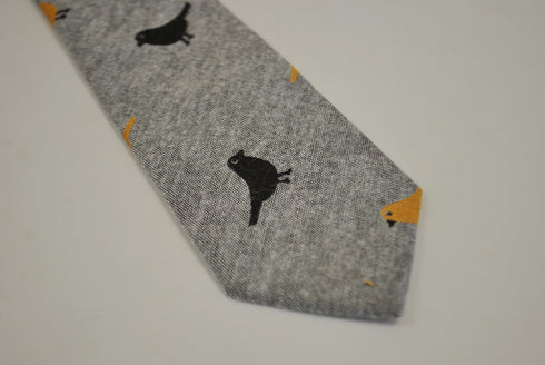 light grey tie with bird design