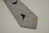 light grey tie with bird design