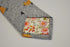 light grey tie with bird design