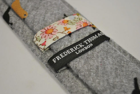 light grey tie with bird design