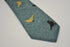 dark green aqua tie with bird design in 100% cotton linen