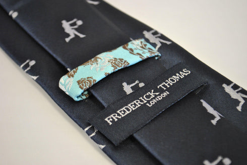 navy tie with tennis player embroidered design
