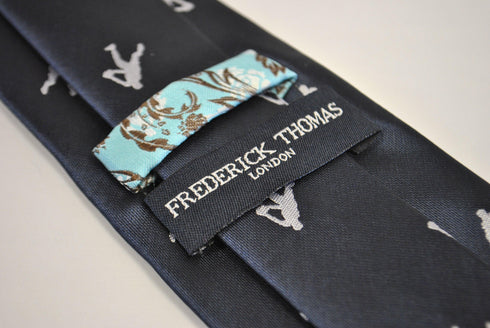 navy tie with rugby player silhouette design