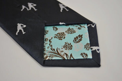 navy tie with rugby player silhouette design