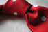 red tie with white polka dots