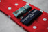 red tie with white polka dots