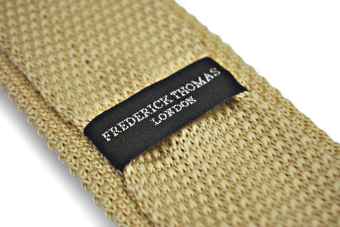 plain ivory knitted tie with pointed end in standard 8cm width