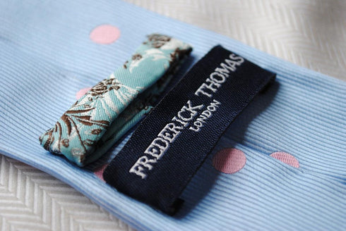 blue tie with pink polka dots