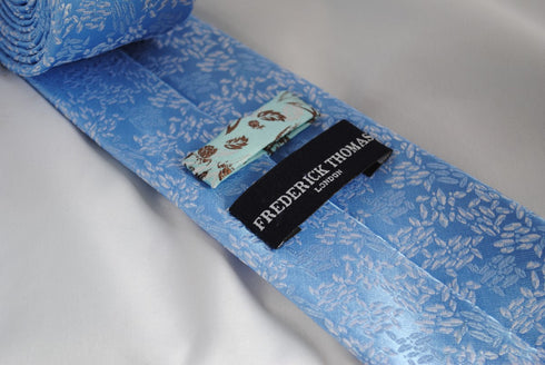 blue tie with floral design