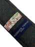 skinny dark green tweed tie with red and blue windowpane design