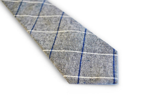 light grey tie with blue and white windowpane design