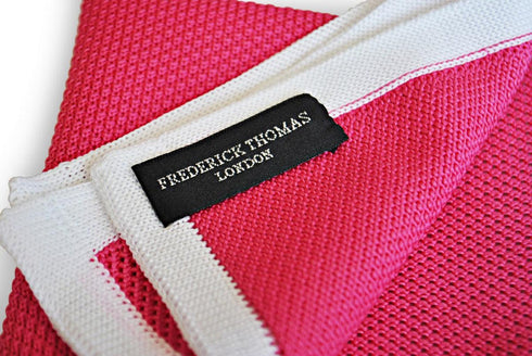 bright pink knitted pocket square with white edging