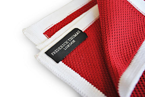 red knitted pocket square with white edging