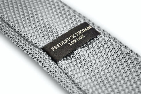 plain light grey skinny knitted tie with pointed end