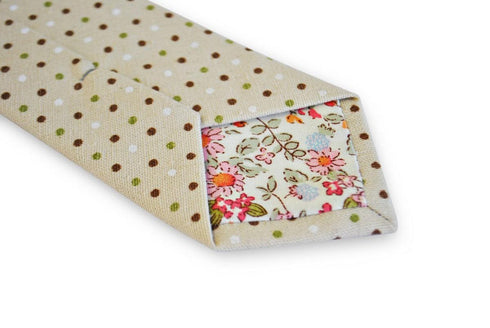 beige tie with green, brown & white spots in 100% cotton