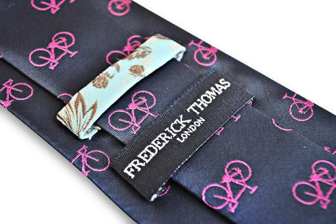 navy tie with pink bicycle design