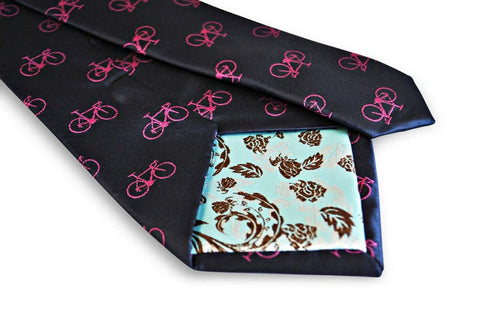 navy tie with pink bicycle design
