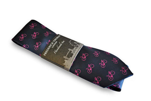 navy tie with pink bicycle design