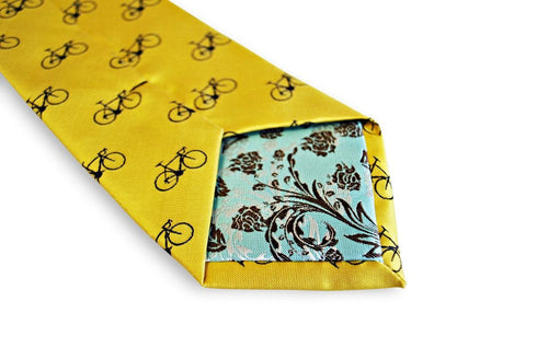 yellow tie with navy bicycle design