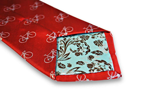 red tie with white bicycle design