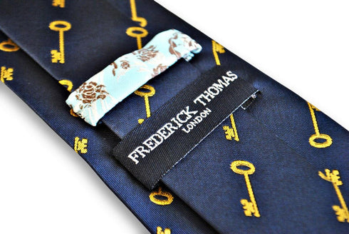 navy blue tie with gold key design