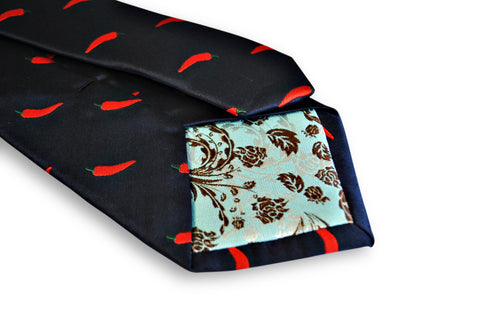 navy tie with red chilli pepper design